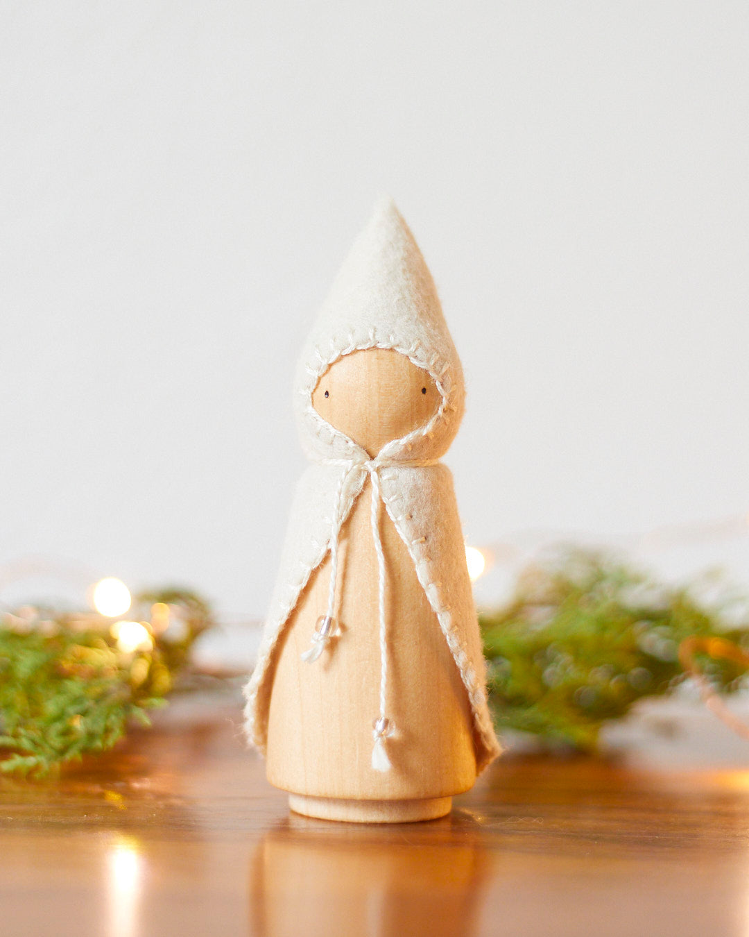 Wooden Gnome with White Beaded Cloak
