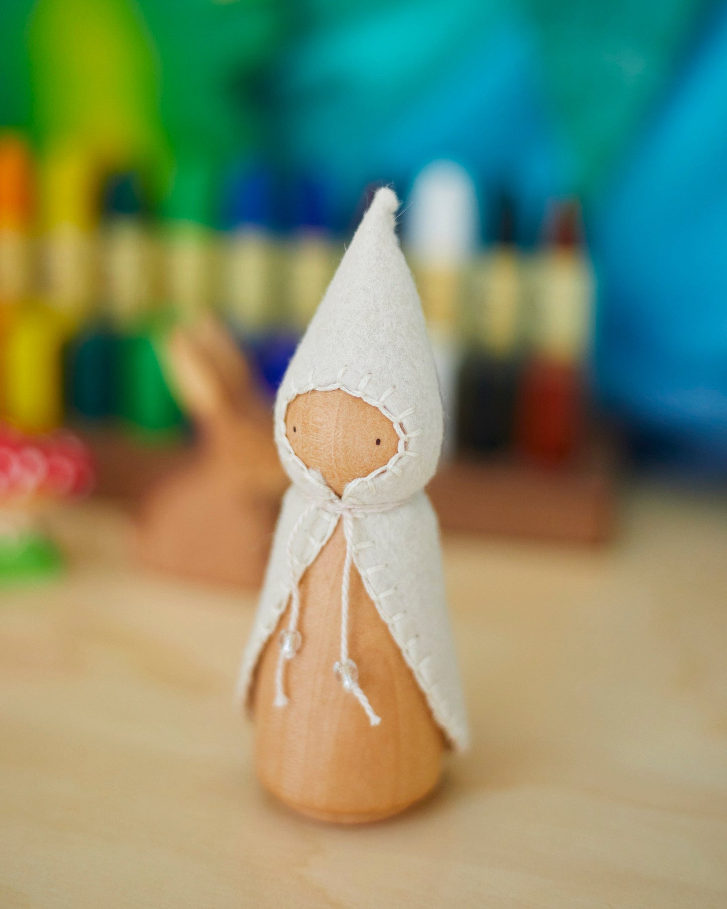 Wooden Gnome with White Beaded Cloak